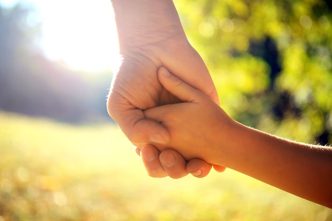 Parent and Child Holding Hands 